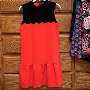 Orange and black scallop dress